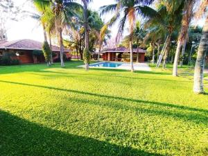 Сад в BauHouse Comfort Suites Asuncion
