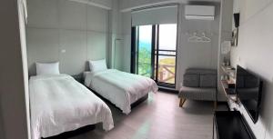 Cama o camas de una habitación en Evi Bnb