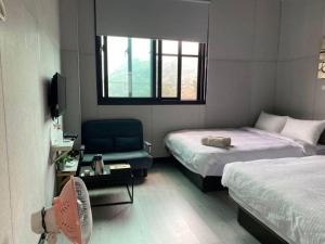 Cama o camas de una habitación en Evi Bnb