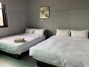 Cama o camas de una habitación en Evi Bnb