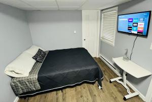 Postel nebo postele na pokoji v ubytování Cozy Apartments close to New York City
