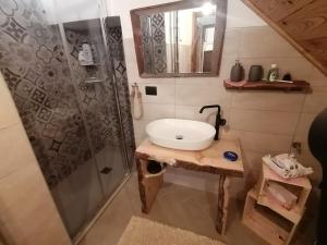 Koupelna v ubytování Ca ad Me Pare Alloggio con terrazza panoramica solarium + 37 fotografií