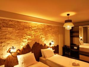 Letto o letti in una camera di Hotel Ushba in Mestia