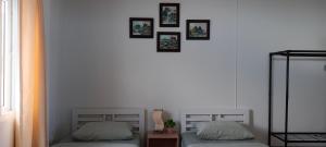 Postel nebo postele na pokoji v ubytování B&N House