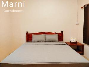 Ένα ή περισσότερα κρεβάτια σε δωμάτιο στο Marni Guesthouse