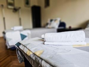 Postel nebo postele na pokoji v ubytování Square Apartments
