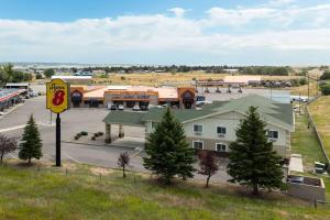 an overhead view of a small town with a gas station at Super 8 by Wyndham Big Timber in Big Timber