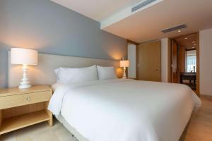 Кровать или кровати в номере Radisson Cartagena Ocean Pavillion Hotel