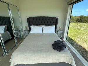 Ocean View Retreat客房内的一张或多张床位
