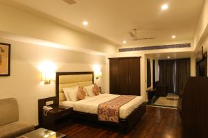 Hotel Natraj Rishikesh客房内的一张或多张床位