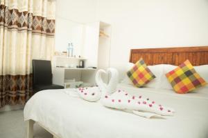 Voodi või voodid majutusasutuse Ithaa Beach toas