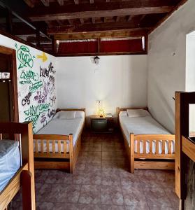 Postel nebo postele na pokoji v ubytování La Casona de la Luz