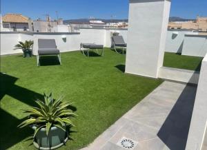 Zahrada ubytování Tarifa Twins Apartamento de lujo con Piscina y wifi