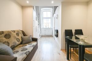 Posezení v ubytování Apartma N'Poznam Tobačna 2