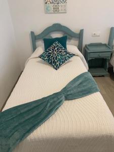Łóżko lub łóżka w pokoju w obiekcie Riumar Nature 38 , piscina , aire acondicionado , barbacoa y pàrquing Privado