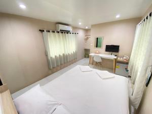 Postel nebo postele na pokoji v ubytování Guesthouse 88 Phang Nga