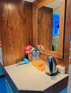 a kitchen counter with a tea kettle on it at Mom Boutique Railay in Railay Beach