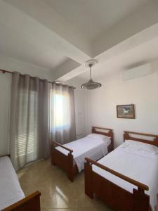 Postel nebo postele na pokoji v ubytování Guest House Irvin