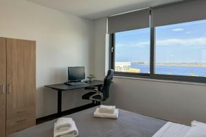 A television and/or entertainment centre at Villa Valentina Chania