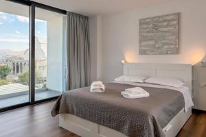 A bed or beds in a room at Villa Valentina Chania