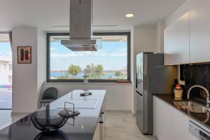 A kitchen or kitchenette at Villa Valentina Chania