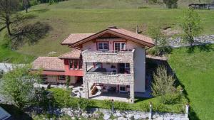 an aerial view of a house in a field at Ferienhaus Philipp Rofner in Leogang