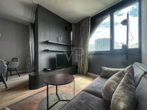 Χώρος καθιστικού στο Suites im Cloud