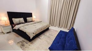 Postel nebo postele na pokoji v ubytování Splendid Villa Rooms near Dubai Airport