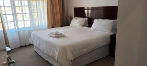 Postel nebo postele na pokoji v ubytování Bontanantana Guest House