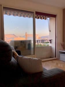 Posezení v ubytování Votre Refuge à proximité des Plages et du Stade Vélodrome + 33 fotografií