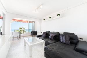 Χώρος καθιστικού στο Luxury Primerísima Línea Playa Poniente Benidorm con 6,5 mts de Vistas Frontales al mar y Parking