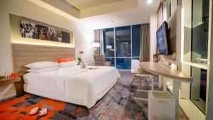 Televisyen dan/atau pusat hiburan di HARRIS Suites fx Sudirman
