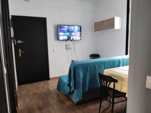 Telewizja i/lub zestaw kina domowego w obiekcie Apartment la paz