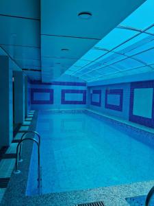 Bazén v ubytování HOTEL RINKY'S PALACE nebo v jeho okolí