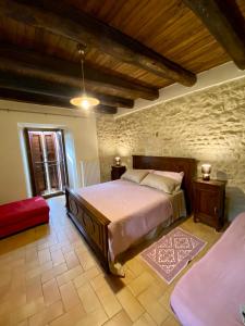 Postel nebo postele na pokoji v ubytování Chateaux de Pep