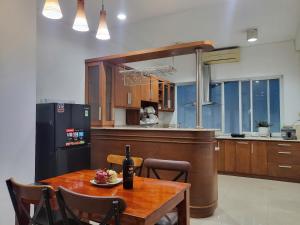 Кухня или мини-кухня в Chez Mimosa Homestay
