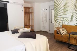 Postel nebo postele na pokoji v ubytování Casa la Siësta Albir + 37 fotografií