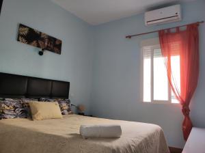 Łóżko lub łóżka w pokoju w obiekcie Apartment la paz