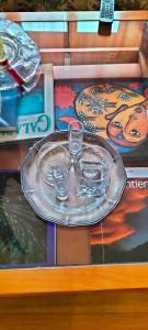 a glass plate with two glasses on a table at La Casita b&b in Bagnoregio +37 photos