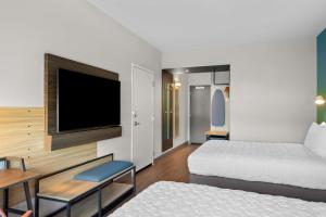 Postel nebo postele na pokoji v ubytování Tru By Hilton Lexington