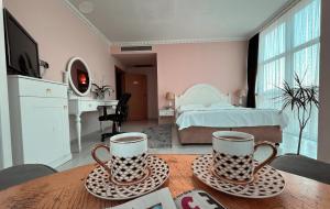 TV a/nebo společenská místnost v ubytování Ottoman Hotel Sakarya