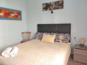 Łóżko lub łóżka w pokoju w obiekcie Apartment la paz