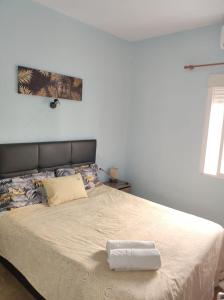 Łóżko lub łóżka w pokoju w obiekcie Apartment la paz