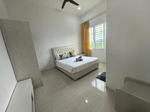Postel nebo postele na pokoji v ubytování Sweet Homestay Suite 3BD Room Langkawi Kuah Langkawi + 63 fotografií