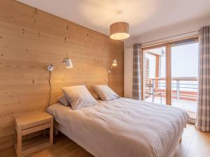 Ένα ή περισσότερα κρεβάτια σε δωμάτιο στο Appartement moderne 3 chambres pour 8 pers. aux Arcs 1800 - FR-1-352-48