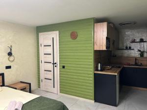Kuchyň nebo kuchyňský kout v ubytování Міні Готель SPA Excellent Family
