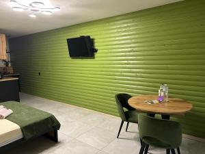 TV a/nebo společenská místnost v ubytování Міні Готель SPA Excellent Family