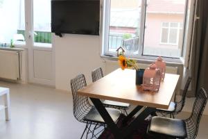TV a/nebo společenská místnost v ubytování Levanten Hostel