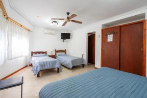 Postel nebo postele na pokoji v ubytování Hosteria Recalada