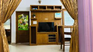 TV a/nebo společenská místnost v ubytování EBs Guest House